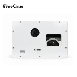 OneCraze ceiling-mounted ball wall projector above a ball pit with a child holding a play ball