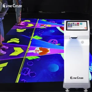 OneCraze Mini SAIO interactive floor projector with a wheeled cabinet and an ocean-themed floor game graphic